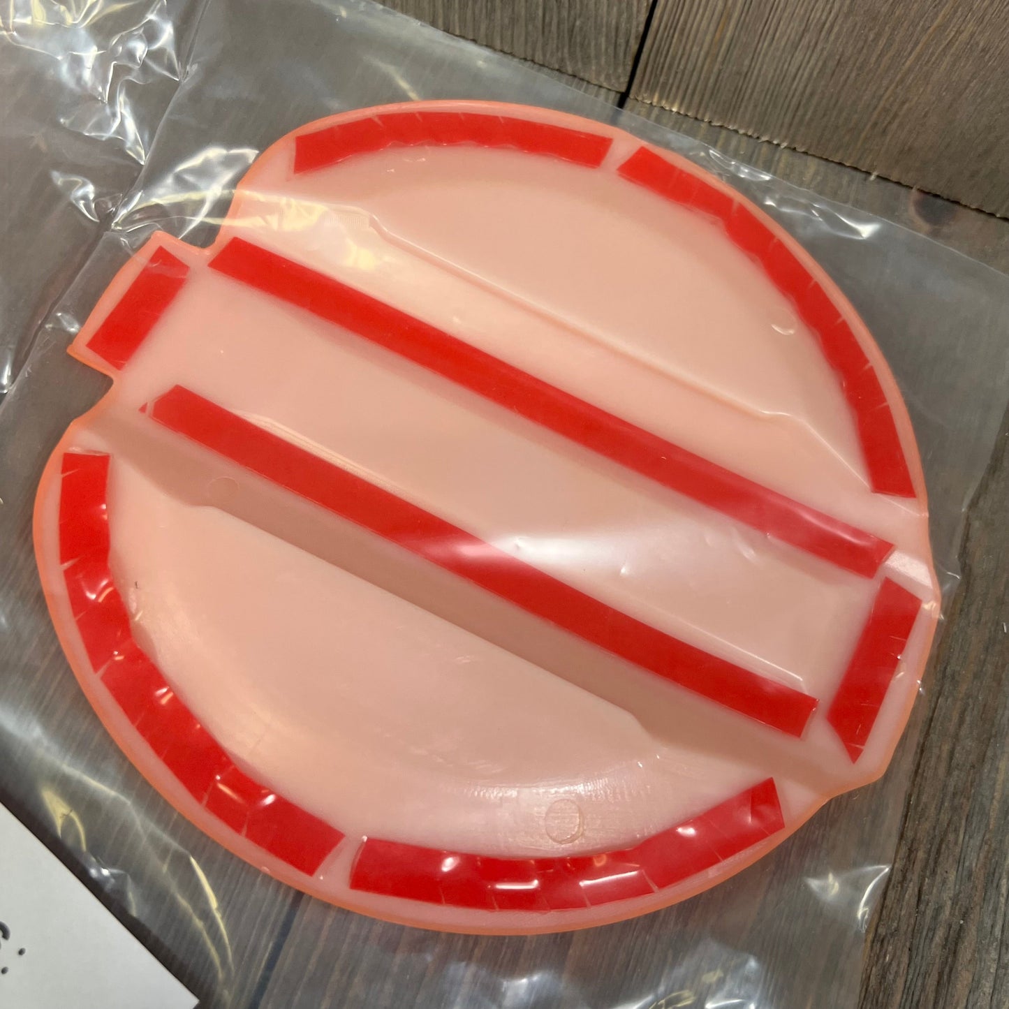 Orange fuel door trim with red accents for Jeep Wrangler JL JLU 4xe and Gladiator JT, enhancing exterior styling.