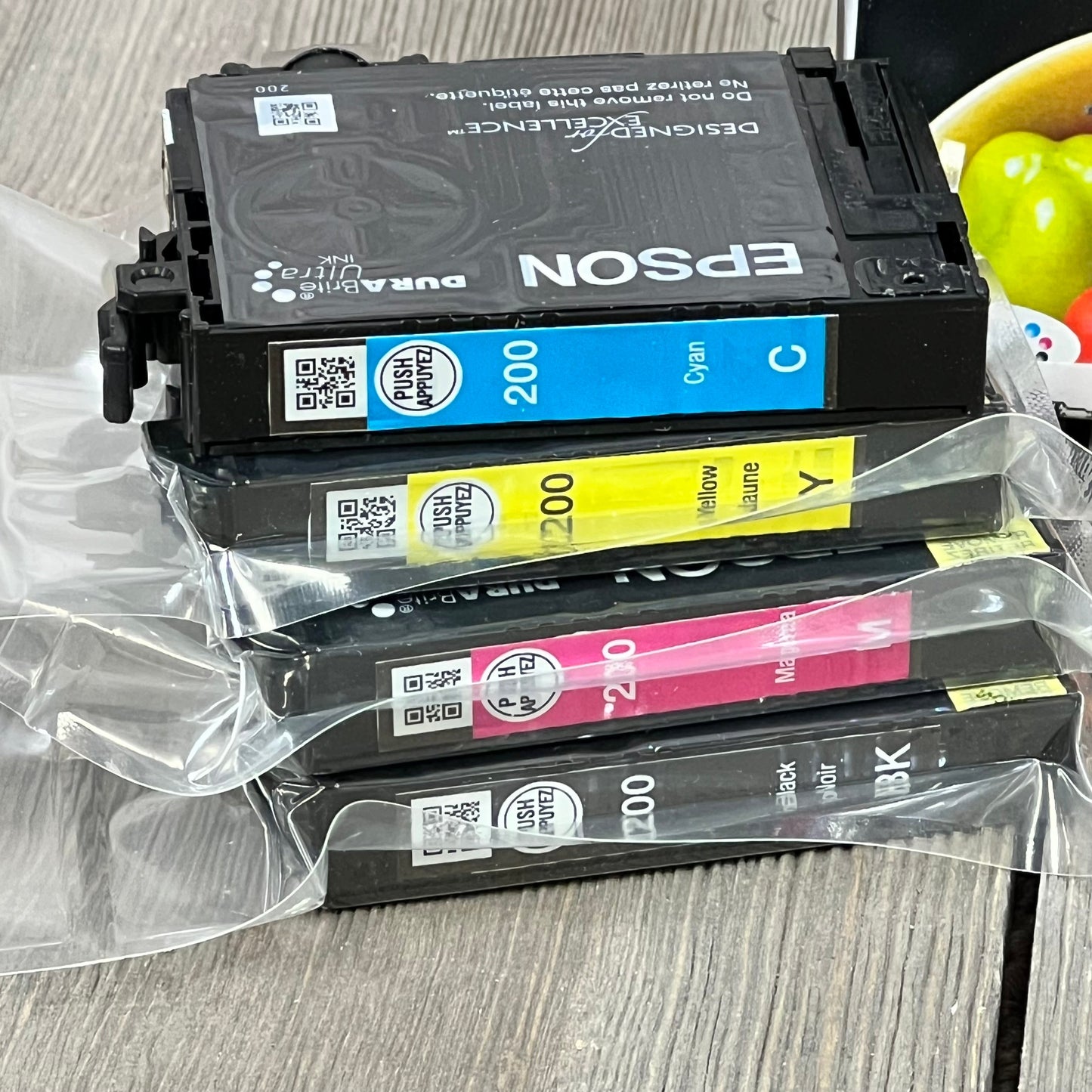 EPSON 220 DURABrite Ultra Ink Cartridges in black and color, sealed in plastic, compatible with WorkForce and Expression printers.
