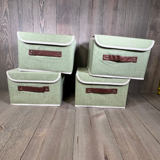 Green cotton linen storage boxes with faux leather handles, perfect for organizing shelves and closets, small size.
