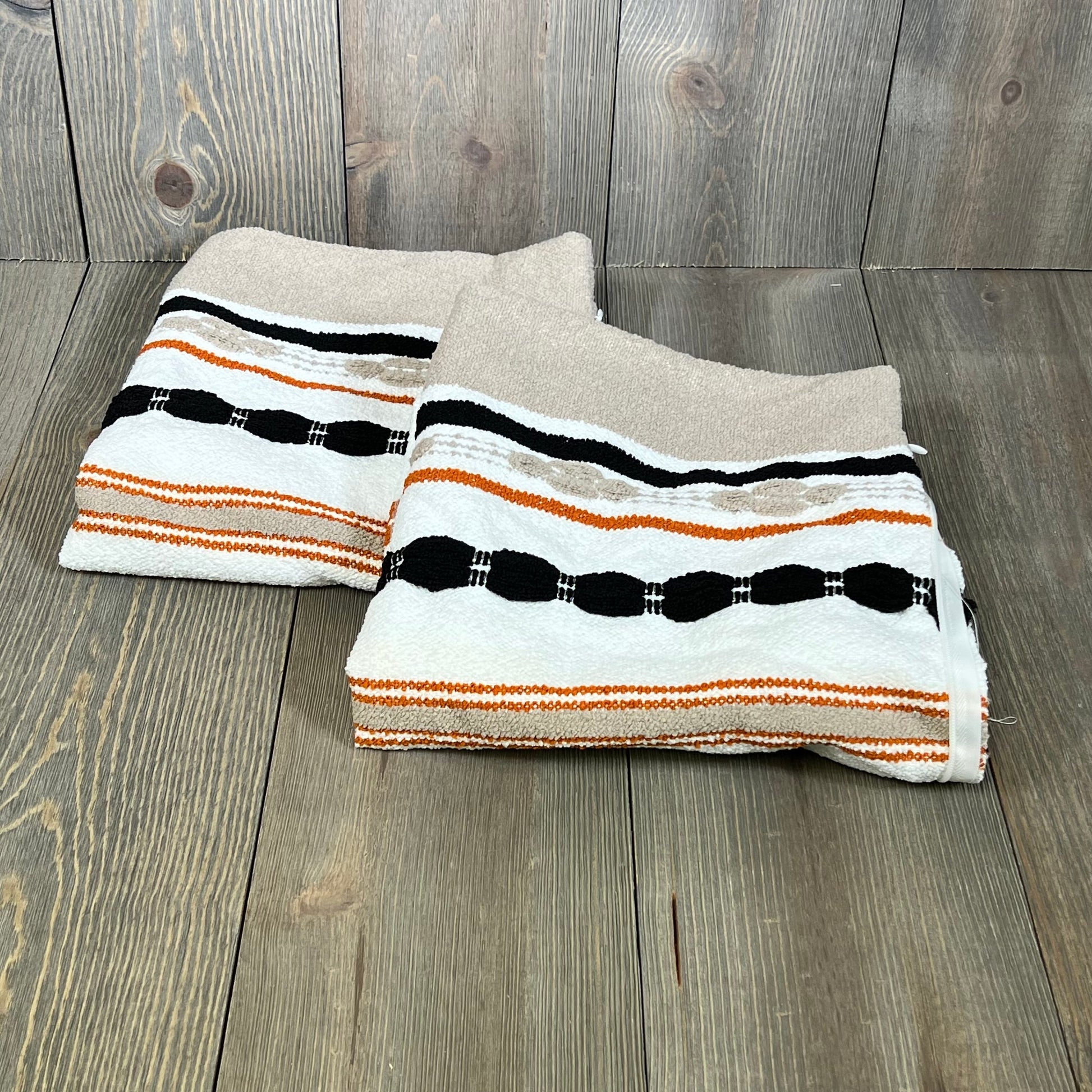 Cozy Wosendy boho pillow covers with orange, black, and beige stripes, perfect for farmhouse decor on couch or bed.