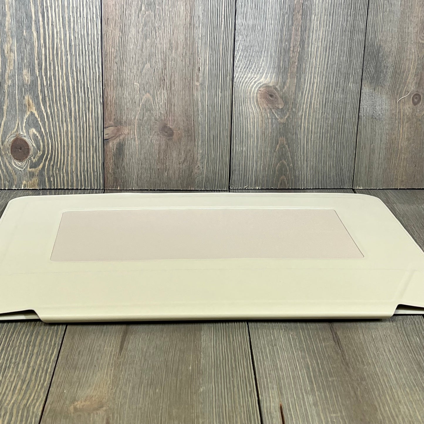 Ultra-slim MOFT laptop sleeve in Beach White, showcasing sleek design for 15"-16" MacBook with expandable storage.