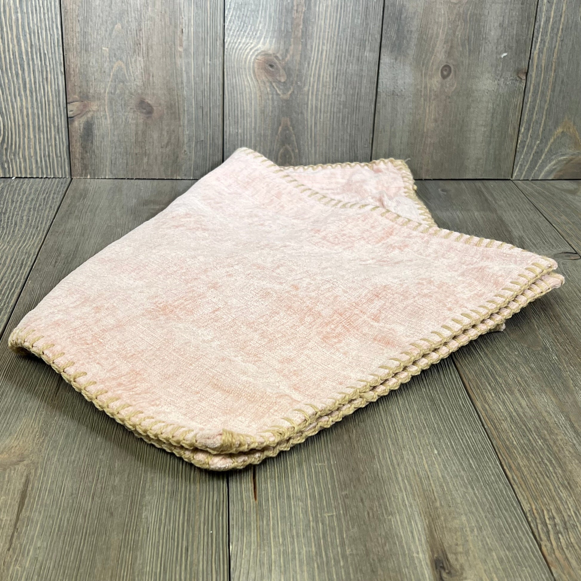 Blush pink chenille pillow cover with stitched edge, ideal for farmhouse decor on sofas and beds, 12x20 inches.