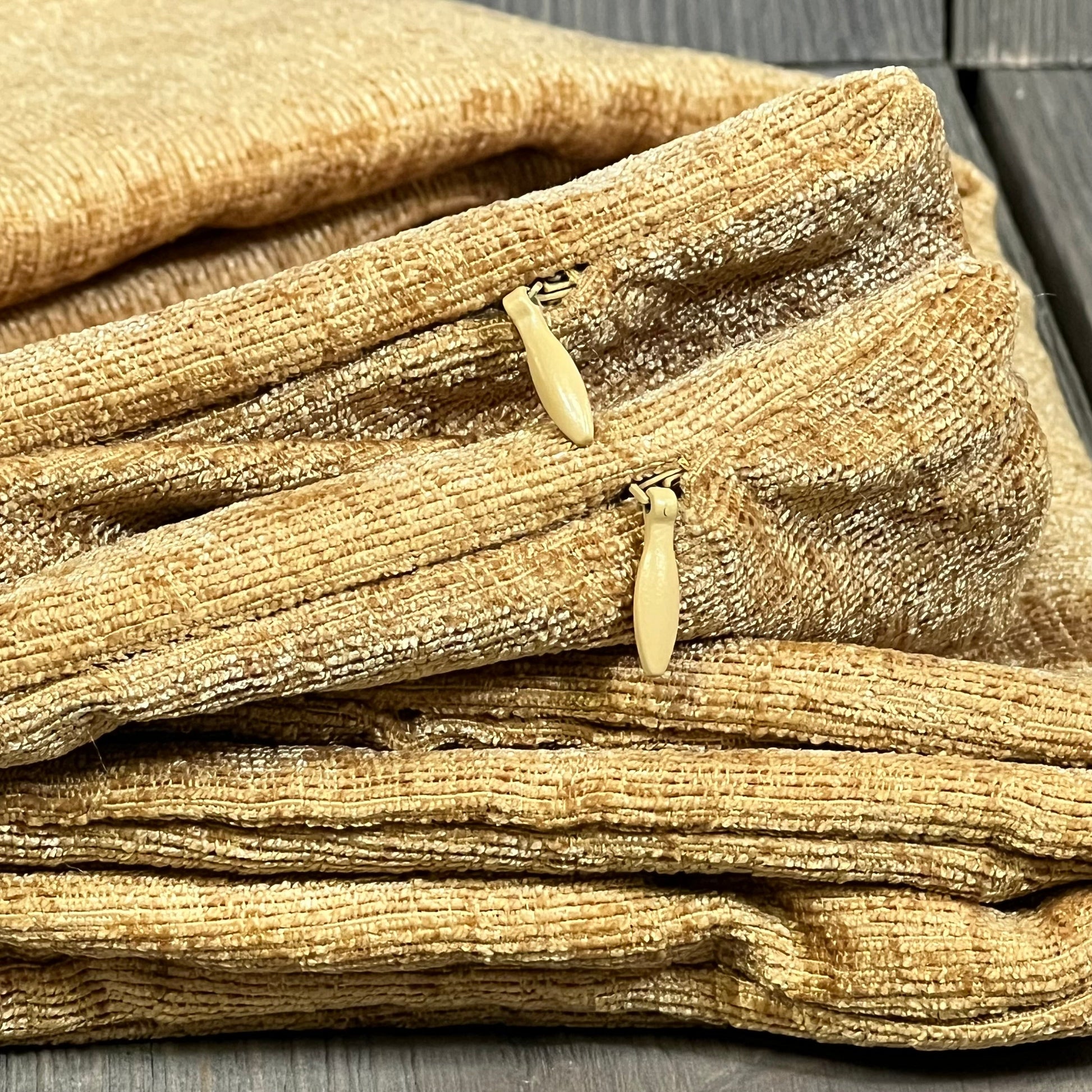 Cozy gold chenille pillow covers with zippers, perfect for adding elegance to your sofa or bed decor.