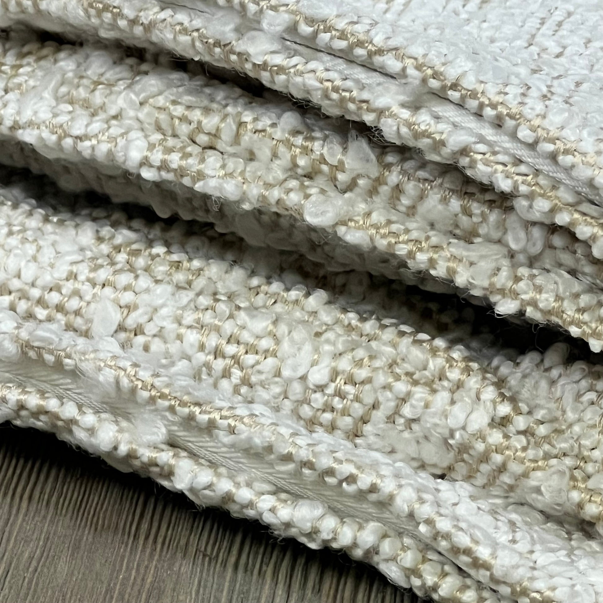 Textured boucle fabric of Woaboy ivory throw pillow cover, showcasing woven details for modern home decor.