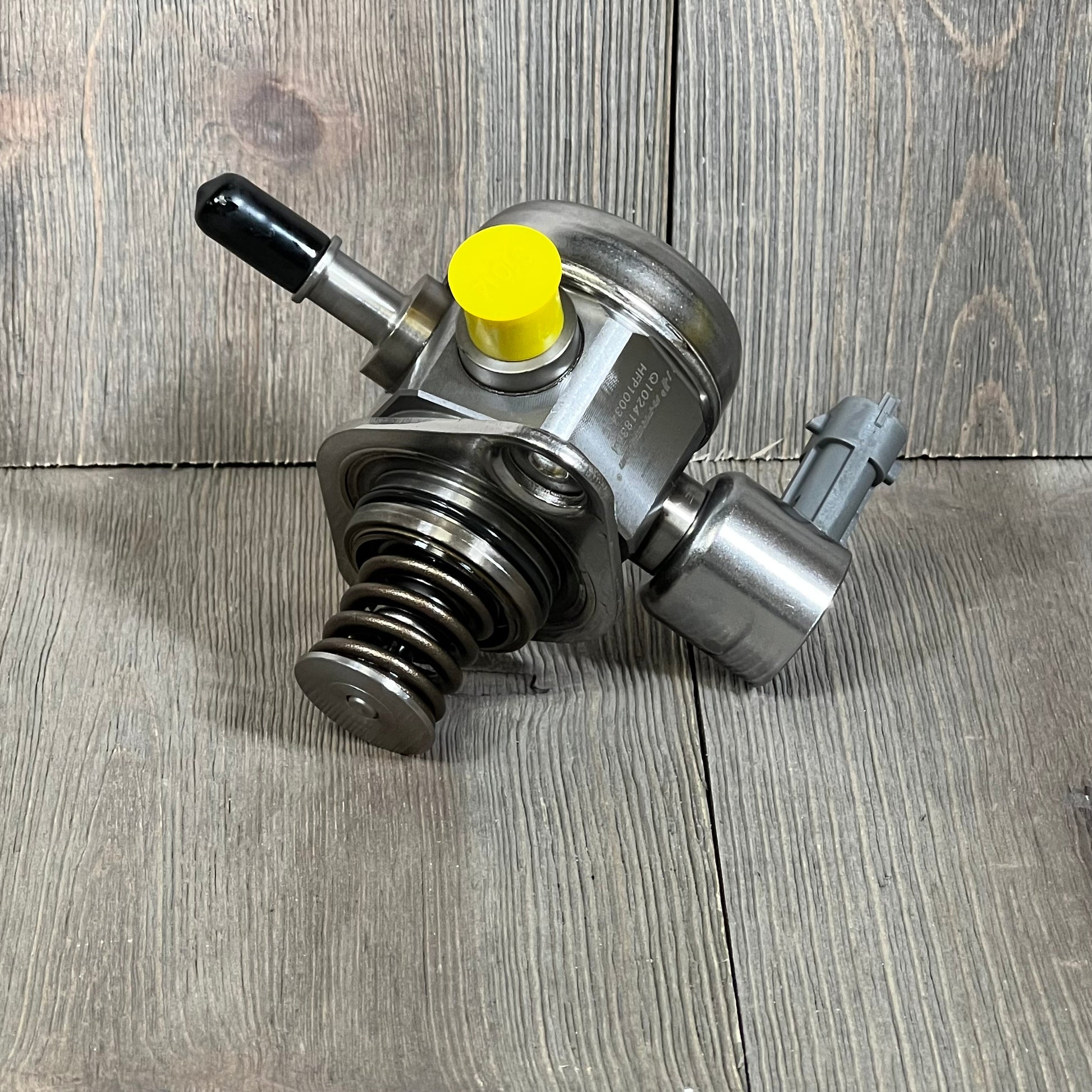 High-pressure fuel pump for Ford Explorer, Taurus, Flex, and Lincoln MKS, MKT. Durable automotive replacement part.