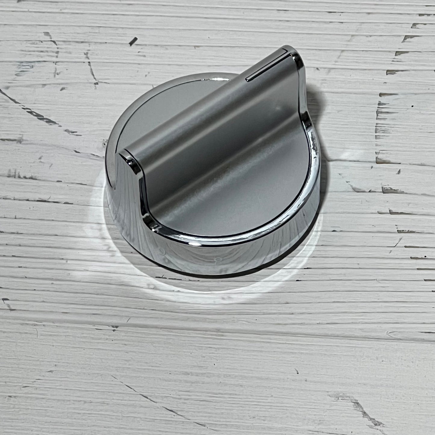 Stainless steel gas stove knob replacement for Whirlpool range, sleek design, compatible with multiple models.