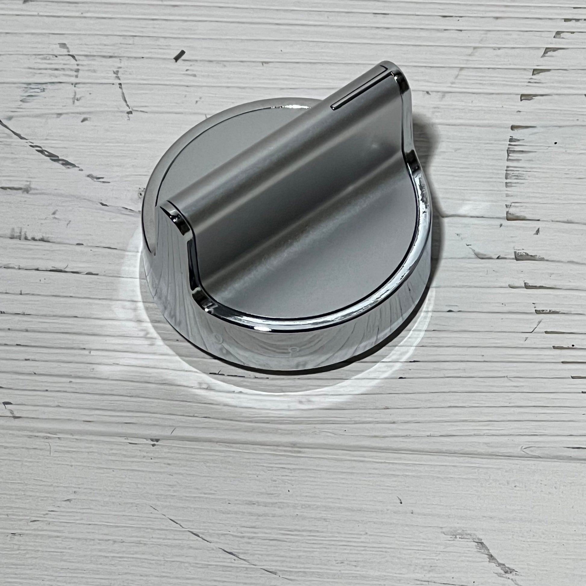 Stainless steel gas stove knob replacement for Whirlpool range, sleek design, compatible with multiple models.