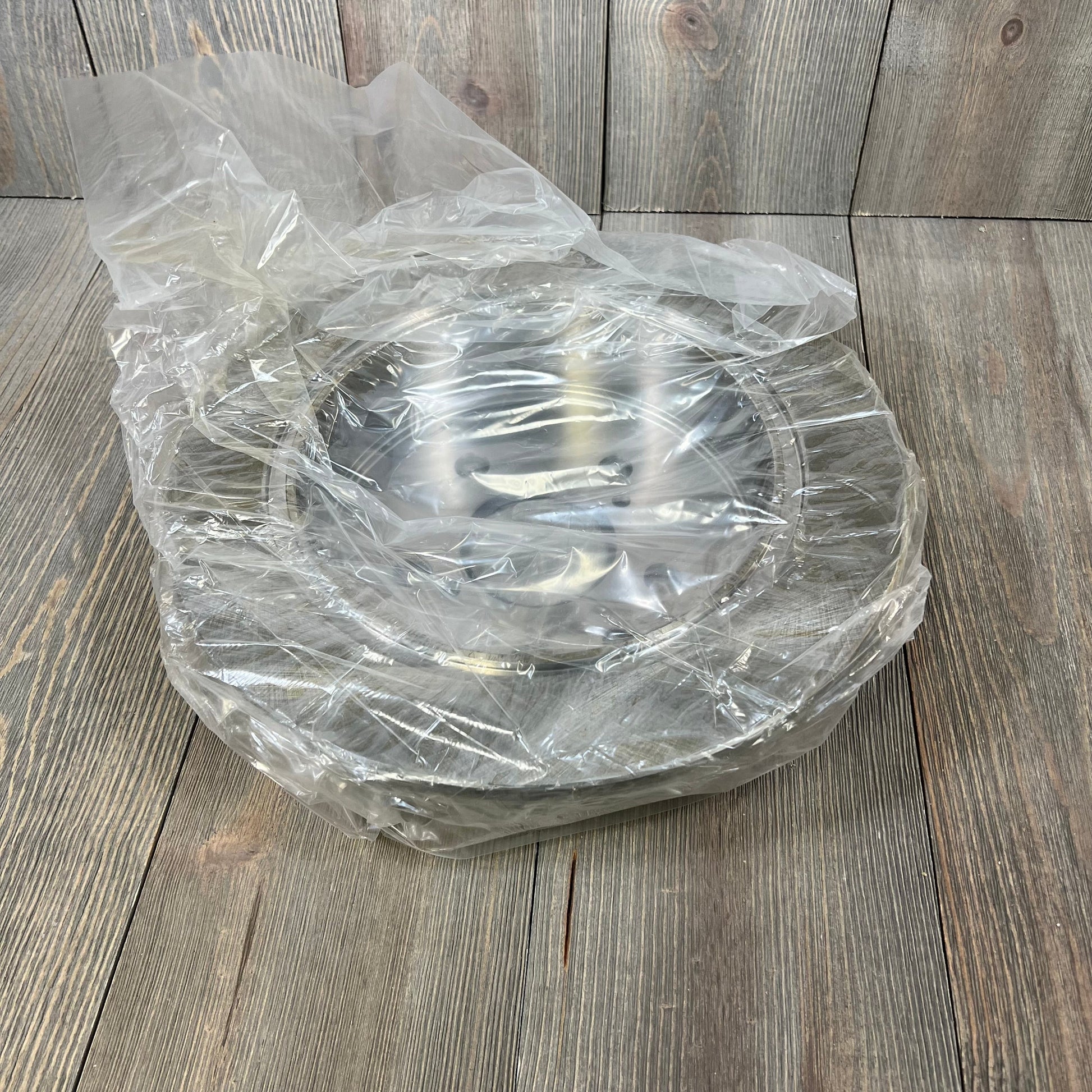 Bendix Premium PRT5941 rear brake rotor for Lexus IS250 2015-2006, wrapped in clear plastic, on wooden surface.