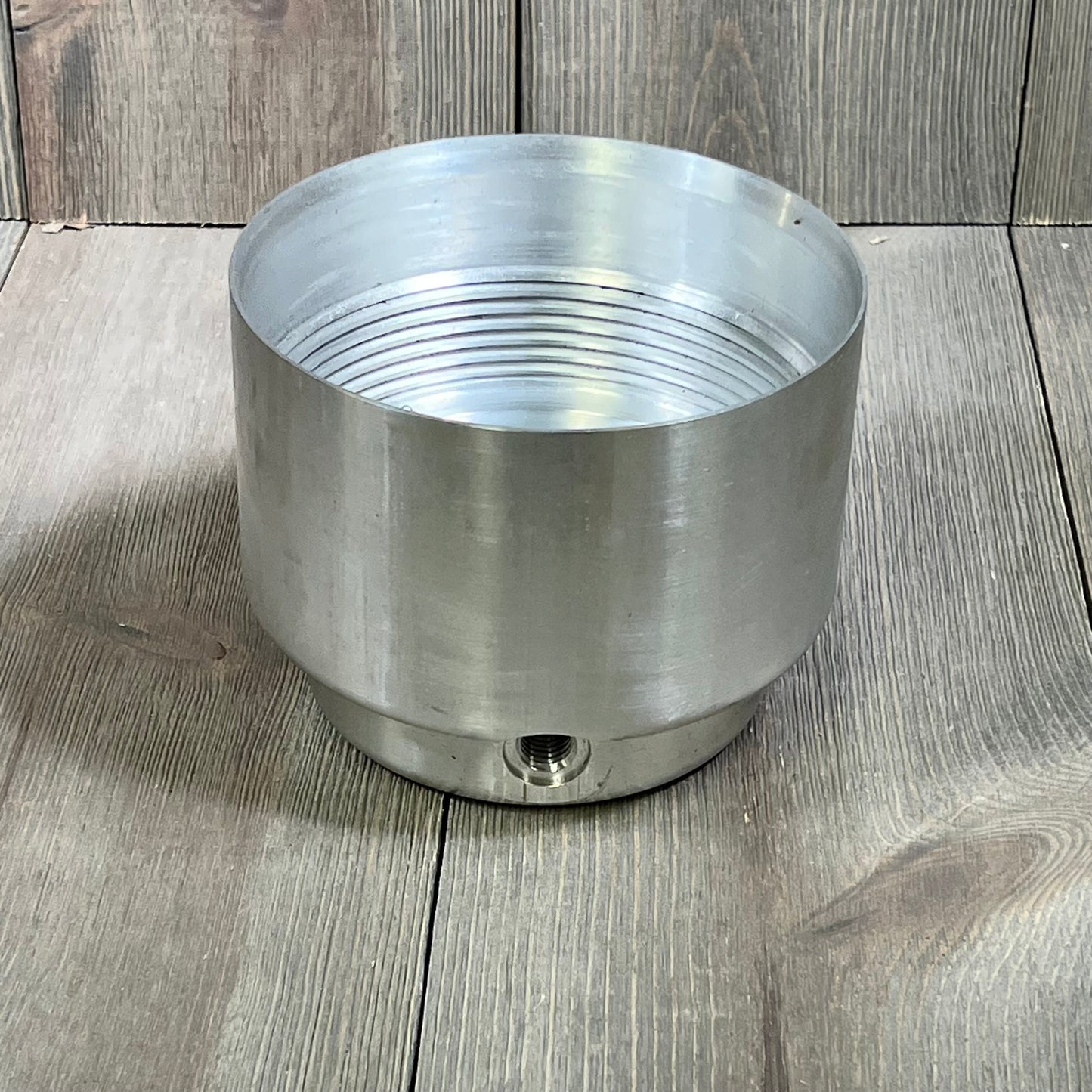 Stainless steel fuel filter housing for 2011-2016 F-250, F-350, F-450 6.7L Powerstroke Diesel, durable construction.