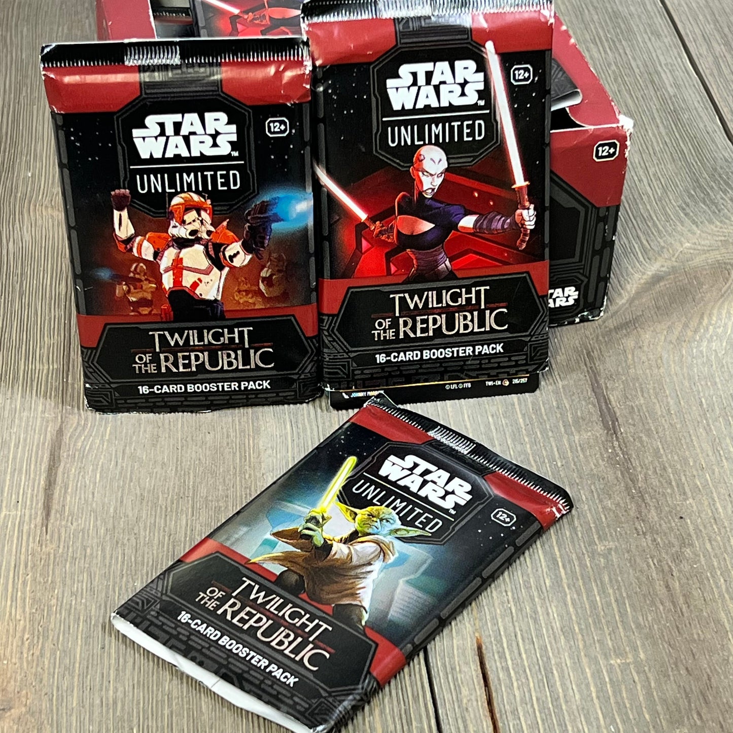 Star Wars Unlimited TCG booster packs from Twilight of The Republic set, featuring iconic characters, ideal for ages 12+.