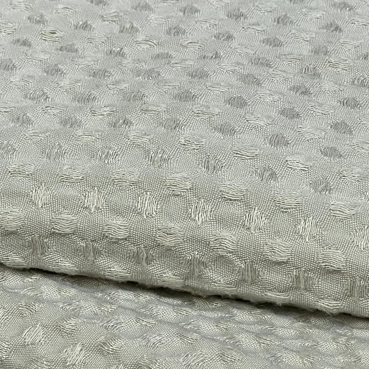 Ultra soft waffle weave pillow shams in light khaki, showcasing intricate texture and breathable fabric.