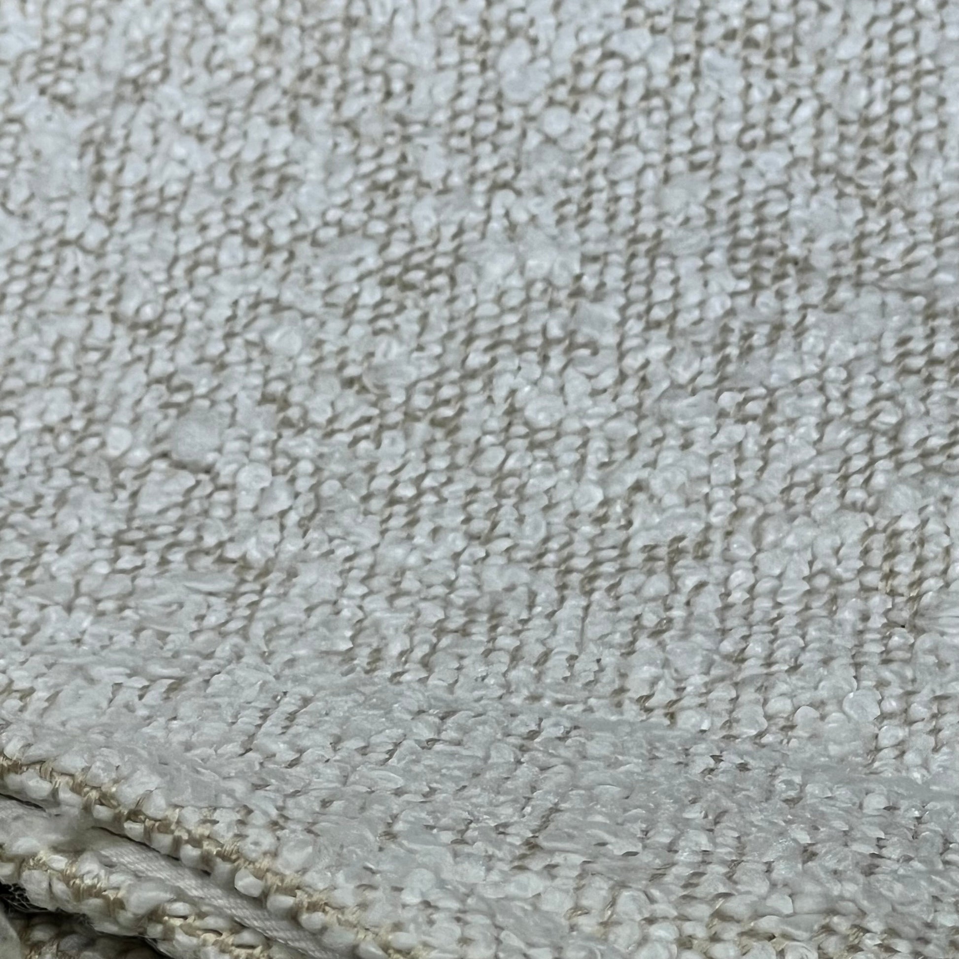 Ivory textured boucle fabric of Woaboy decorative throw pillow cover, showcasing detailed woven craftsmanship for modern home decor.