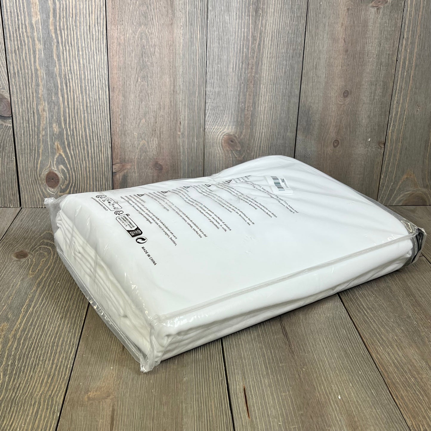 White thermal insulated curtains packaged for bedroom, 108 inches long, ideal for patio glass doors and living room window treatment.