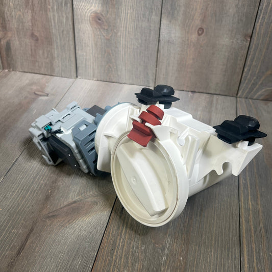 Upgraded drain pump filter assembly for front load washers, compatible with Whirlpool Duet, shown on wooden surface.