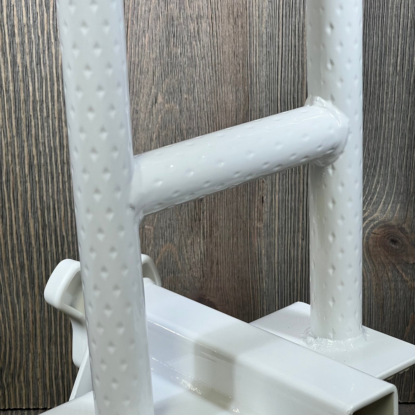 Heavy-duty white bathtub safety rail with anti-slip texture for seniors and handicapped, ensuring secure grip and stability.