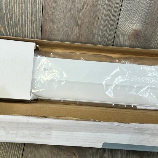 UltraPro 18-inch under cabinet light packaged, offering warm, cool, and daylight settings for versatile kitchen lighting.