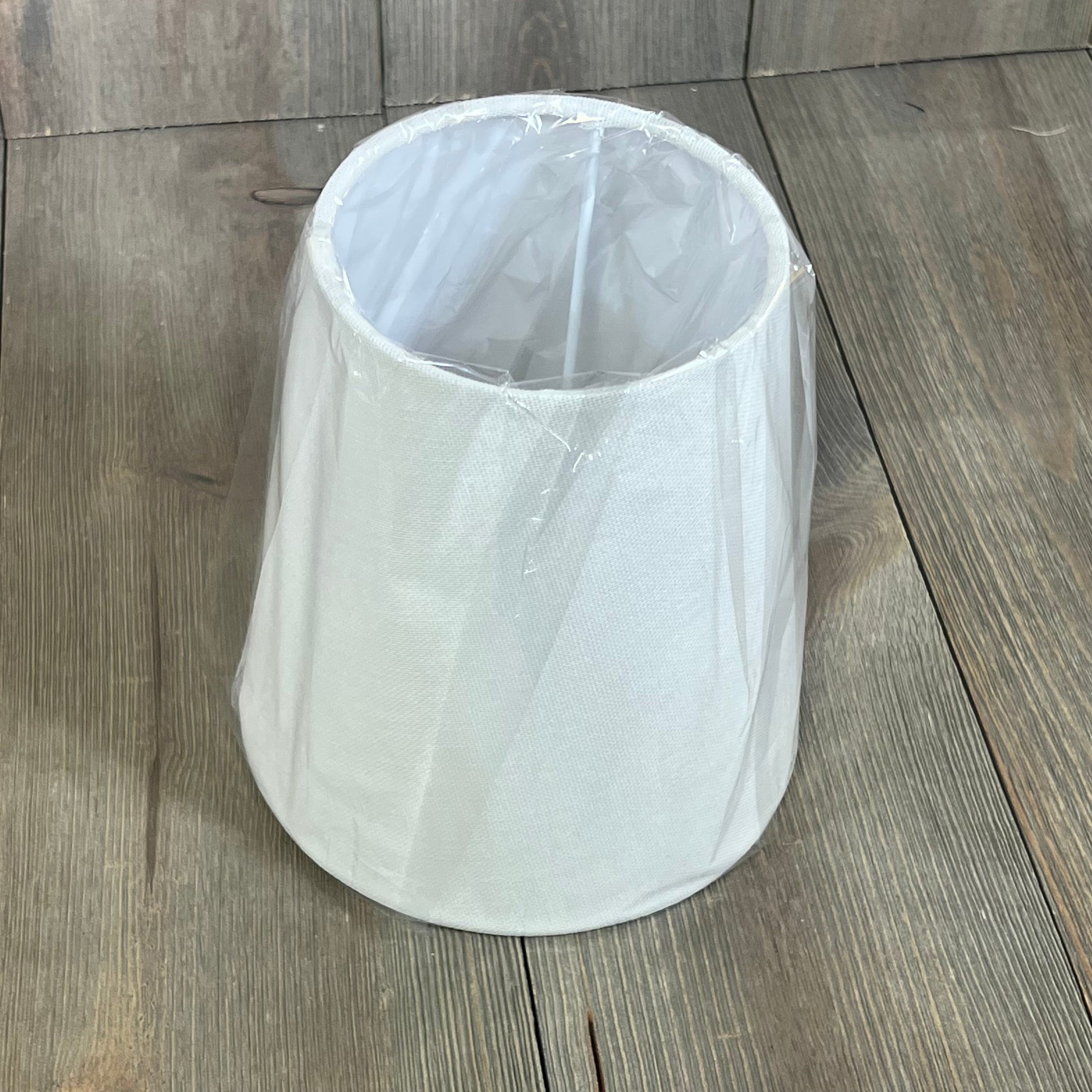 White fabric shade for METWET 2-Light matte black bathroom vanity light, perfect for modern decor in bathrooms and hallways.