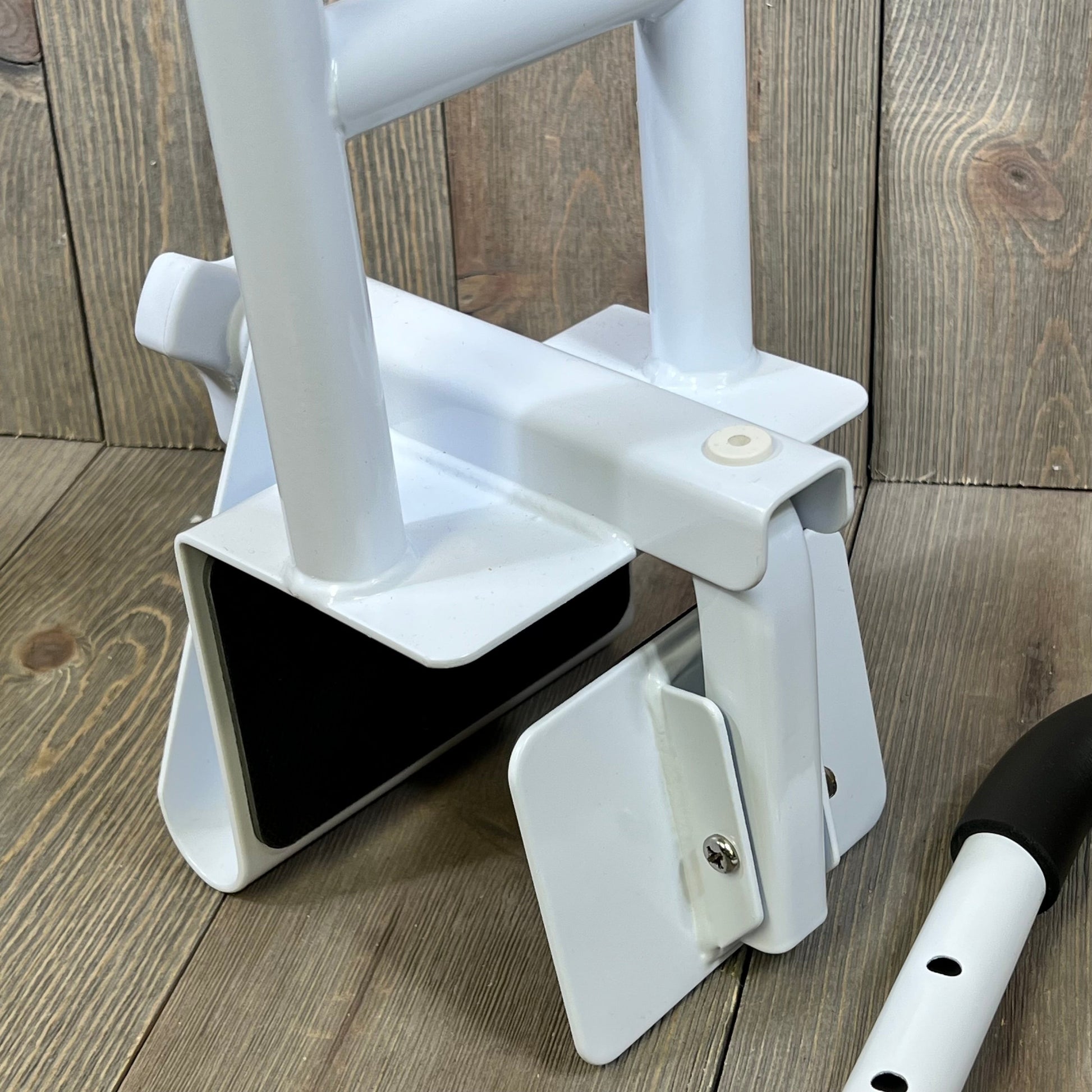 Height-adjustable Vaunn Medical bathtub handle with secure clamp for seniors, featuring a durable white metal finish.