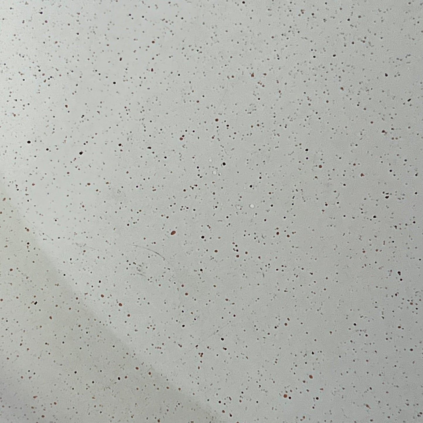 Close-up of SENSARTE 12.5-inch nonstick ceramic frying pan's white speckled surface, highlighting PFAS-free coating.