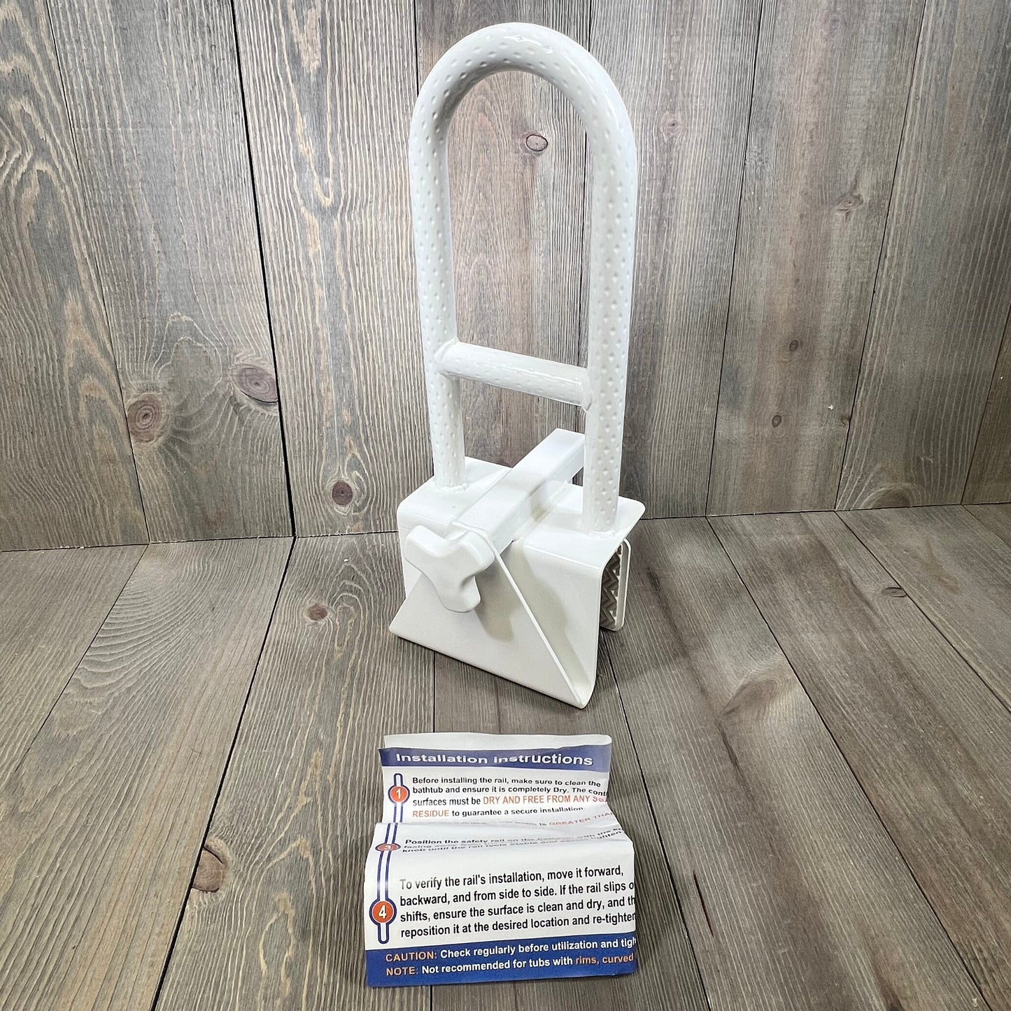 Heavy-duty white bathtub safety rail with anti-slip grip and installation guide, ideal for seniors and handicapped safety.