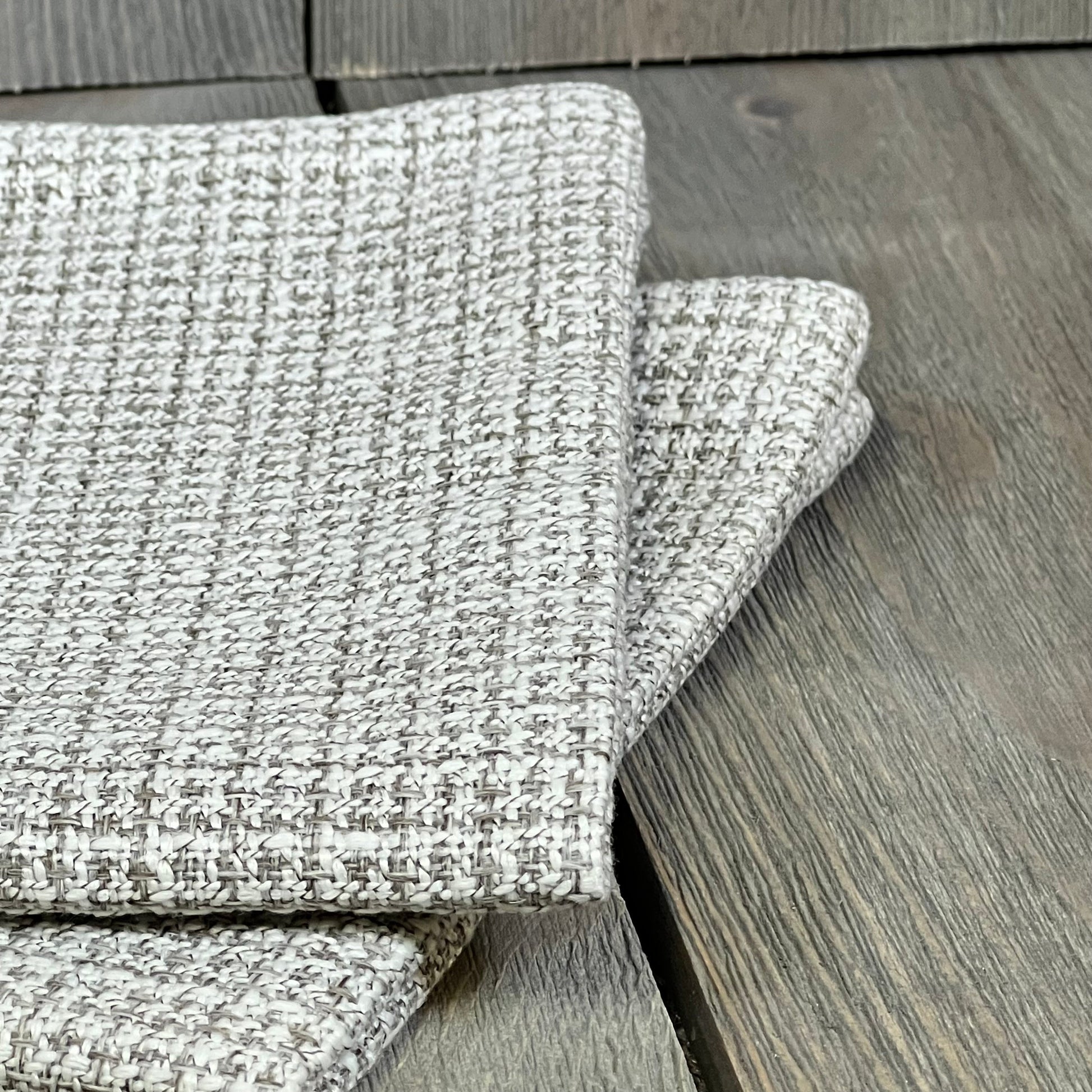 Khaki linen outdoor pillow covers with textured pattern, perfect for patio or sofa, size 16x24 inch, waterproof and durable.