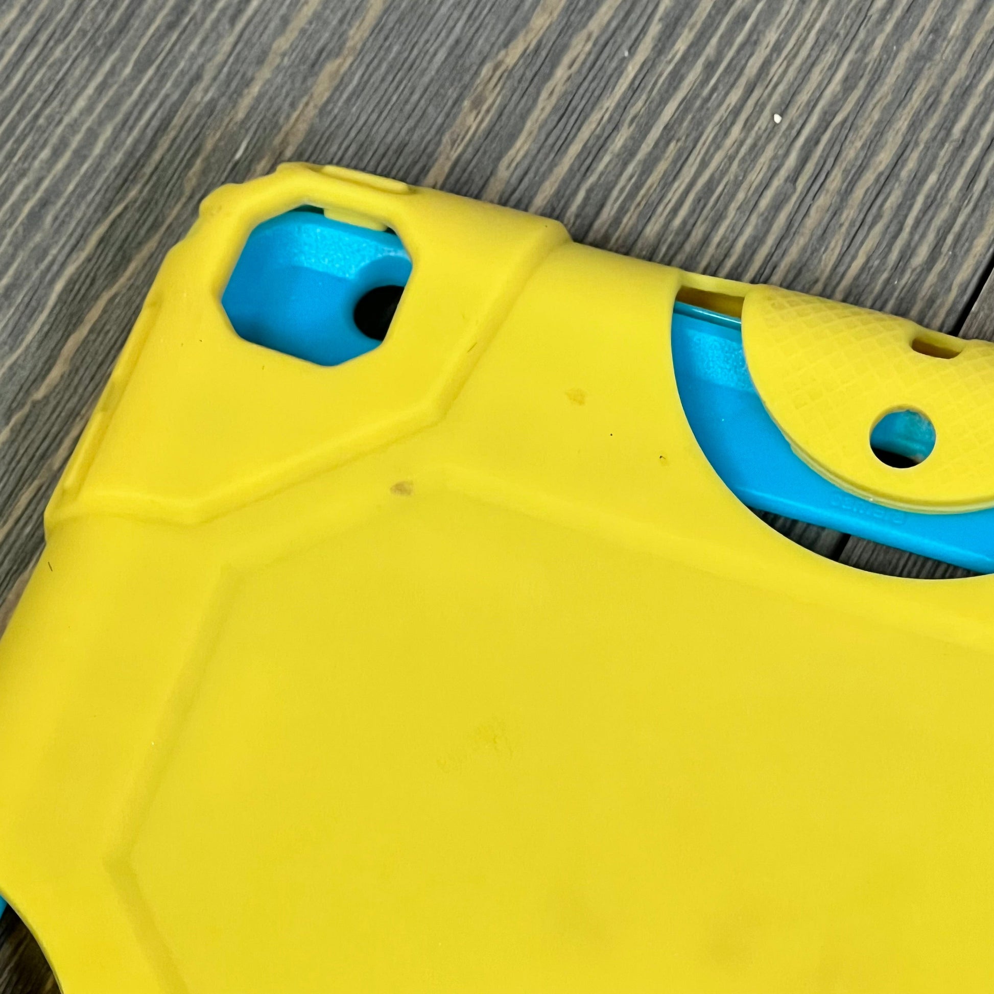 Yellow and blue rugged shockproof iPad case, designed for 9th/8th/7th Gen, featuring kid-friendly protective cover.