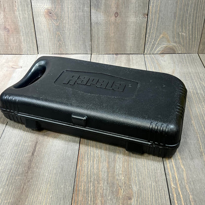Black plastic case for electric knife storage and transport.