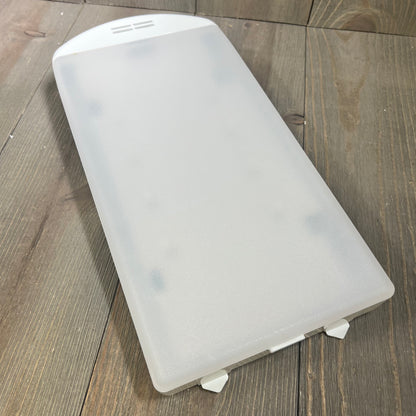 Refrigerator LED light module replacement for Whirlpool, Maytag, Amana on a wooden surface.