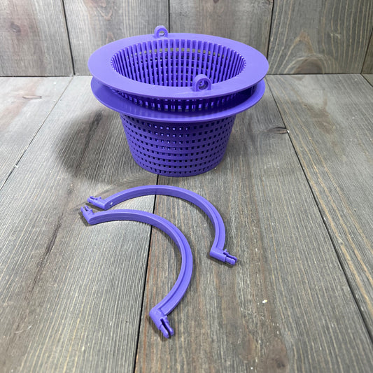 Alt text: Two purple pool skimmer baskets with handles on a wooden surface.