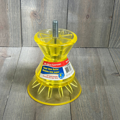 Yellow SeaSense Super Polymer Bow Roller, 4-inch, with a sturdy design on a wooden background.