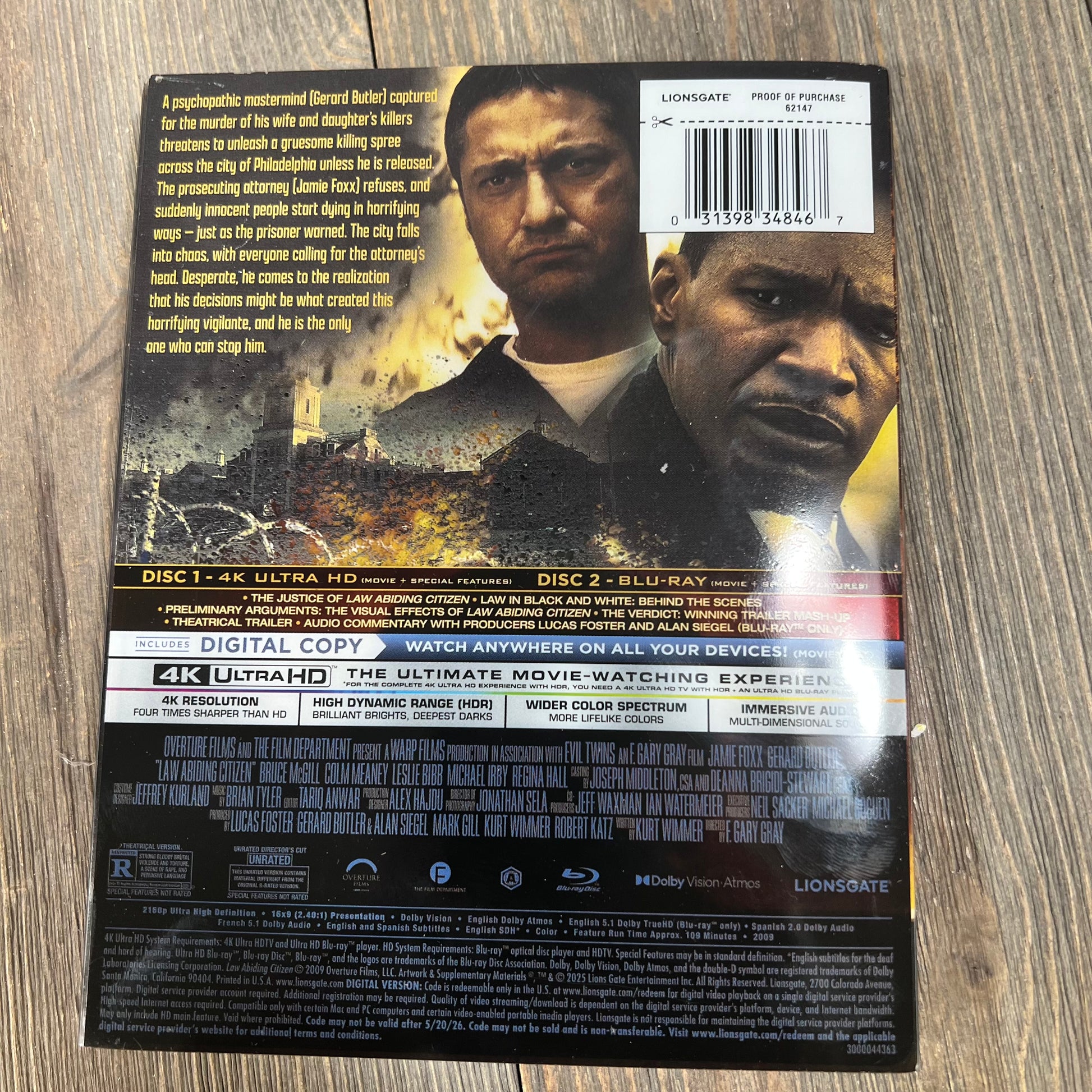"Law Abiding Citizen" 4K UHD + Blu-ray + Digital Steelbook, Amazon Exclusive, back cover with movie details and features.