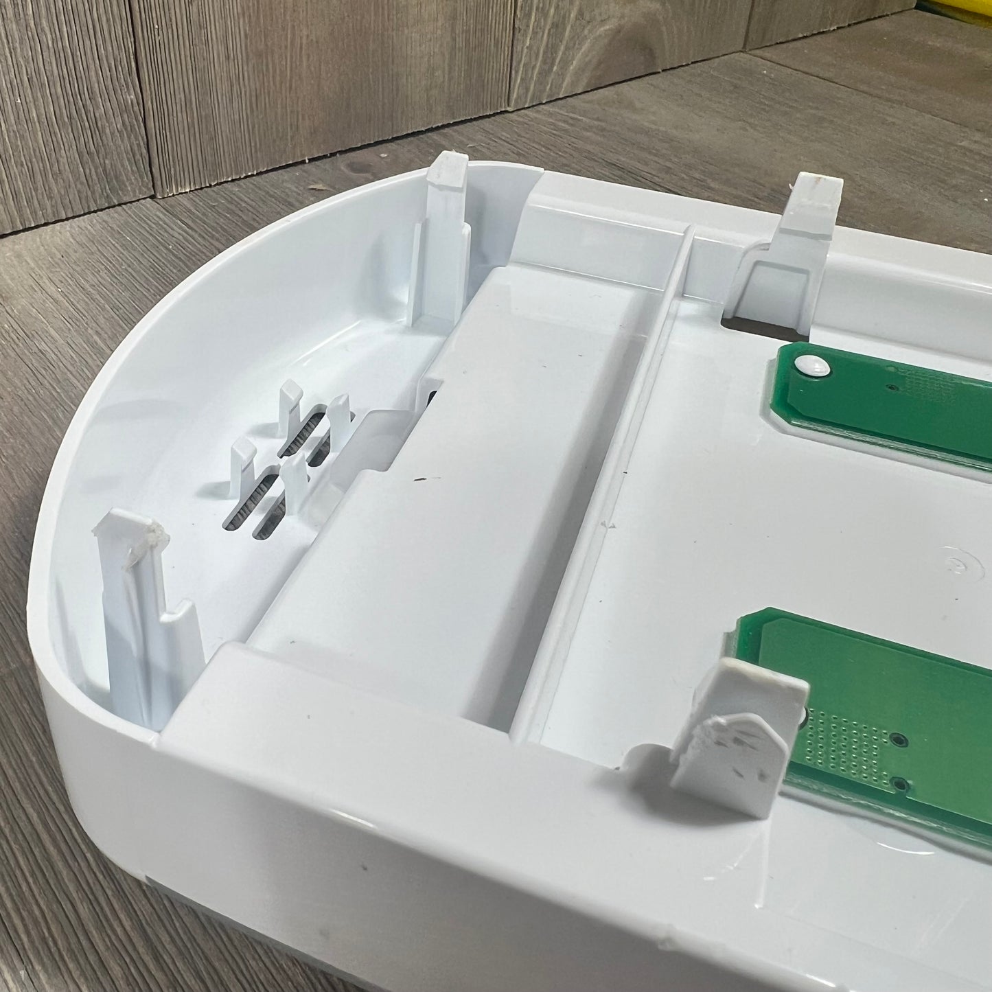 Alt text: Close-up of a refrigerator LED light module assembly replacement for Whirlpool, Maytag, Amana, showing white plasti