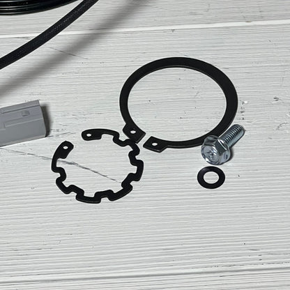 AC Compressor Clutch Set components for Mazda 3 2010-2013, featuring gaskets and a bolt on a white surface.