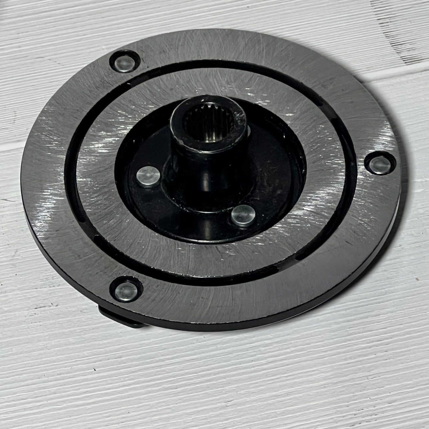 AC Compressor Clutch Set for Mazda 3, 2010-2013, durable metal construction on white background.