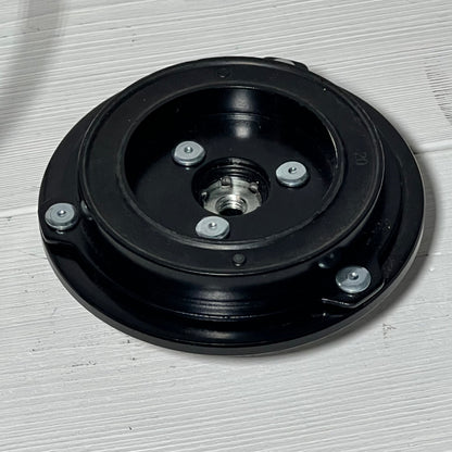 AC compressor clutch set for Mazda 3, 2010-2013, featuring durable black metal construction with bolt details.