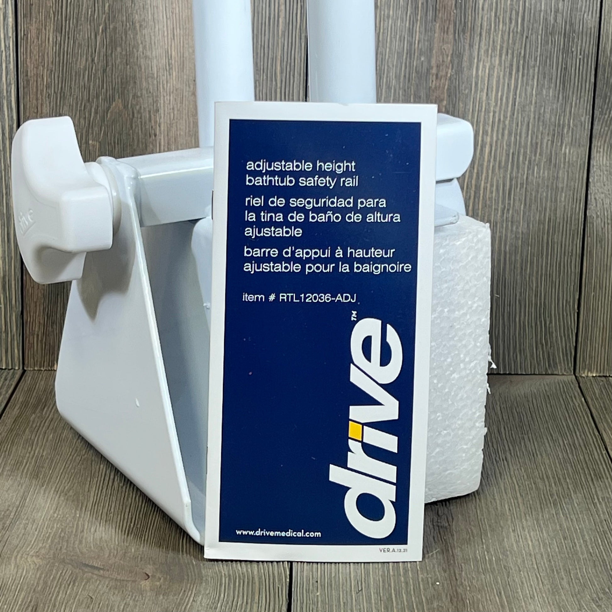 Adjustable white bathtub grab bar by Drive Medical, offering secure and stable bathroom support for safety and assistance.