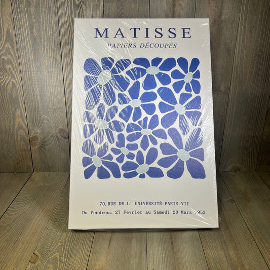 Matisse-inspired blue flower wall art, abstract and minimalist, perfect for modern living rooms or bedrooms, 16x24 inch framed.