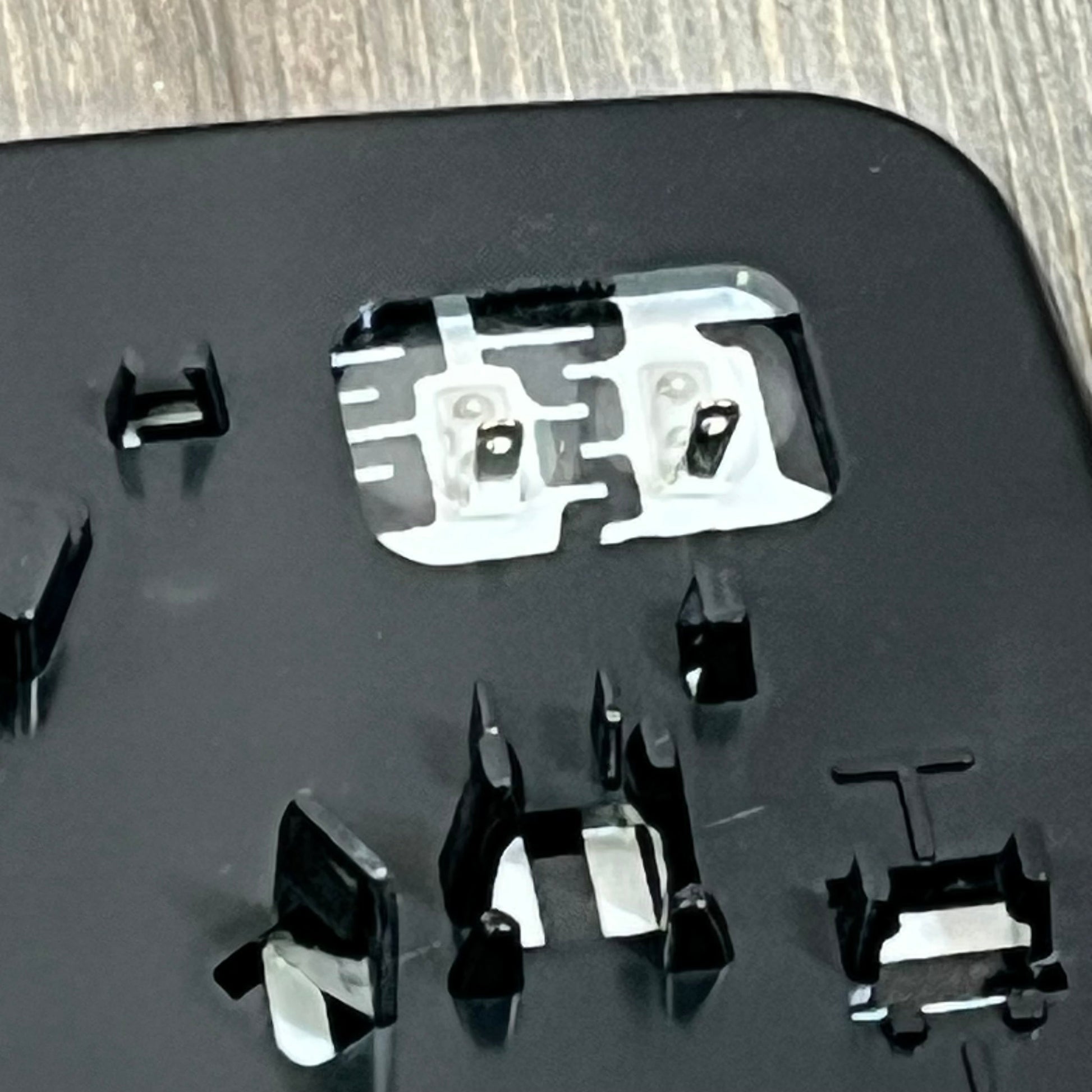 Close-up of rear holder for heated side mirror glass replacement for 2015-2020 Ford F150 and 2017-2020 Ford F250 F350.