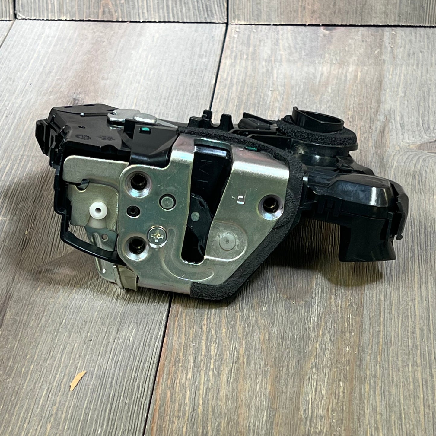 Front right passenger side door lock actuator for Toyota and Lexus models, featuring durable metal and plastic components.
