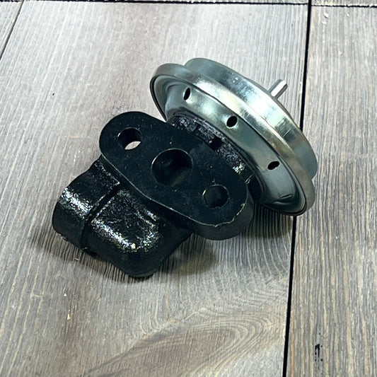 CARMOCAR EGR valve EGV575 for Ford F-150, F-250, and Mercury Sable, shown on a wooden surface.