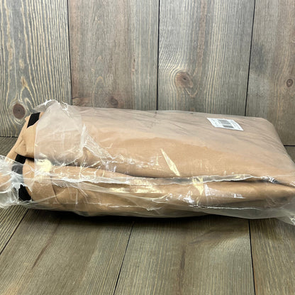 Waterproof outdoor TV cover in packaging for 50-54 inch screens, featuring durable material and clear front flap.