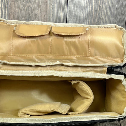 Beige camera insert bag divider with padded compartments and handle, ideal for organizing DSLR gear in backpacks.