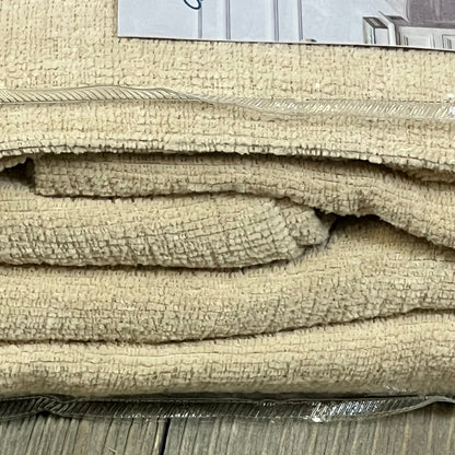 Beige chenille throw pillow covers in packaging, showcasing soft texture for farmhouse decor in living room or bedroom.