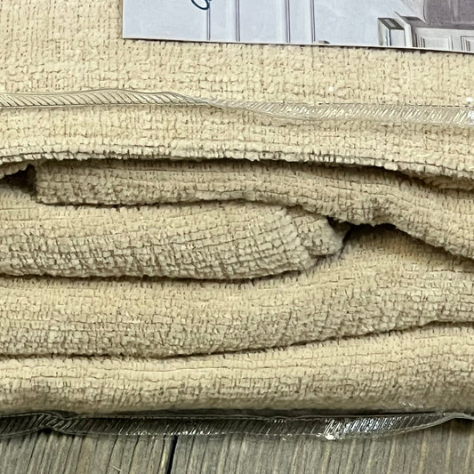 Beige chenille throw pillow covers in packaging, showcasing soft texture for farmhouse decor in living room or bedroom.