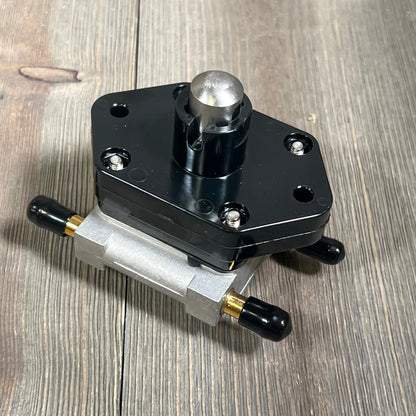 Fuel pump replacement for Mercury 30-60 HP outboard, black and silver design on wooden surface.
