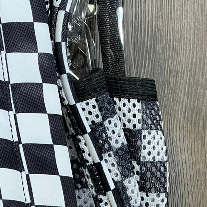 Clear mini backpack with checkered pattern detailing, ideal for stadium events and concerts. Transparent and stylish design.