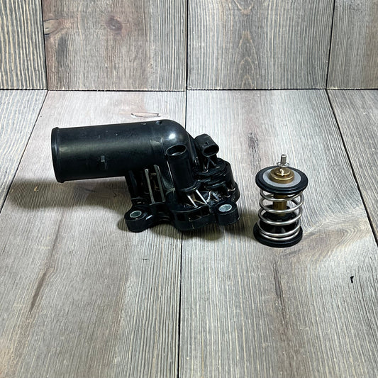 Thermostat Housing Assembly for Dodge Jeep Ram 3.6L V6, showcasing durable construction and precision fit.