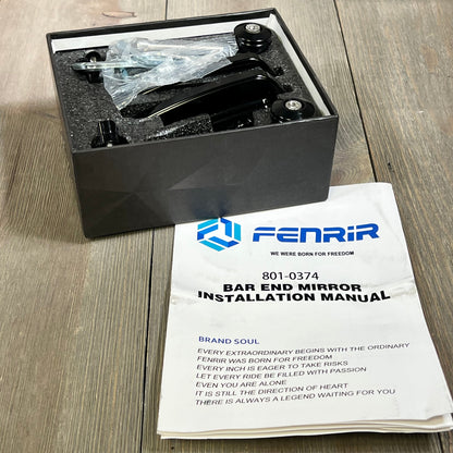 FENRIR CNC Aluminum Bar End Mirrors in box with installation manual on wooden surface.