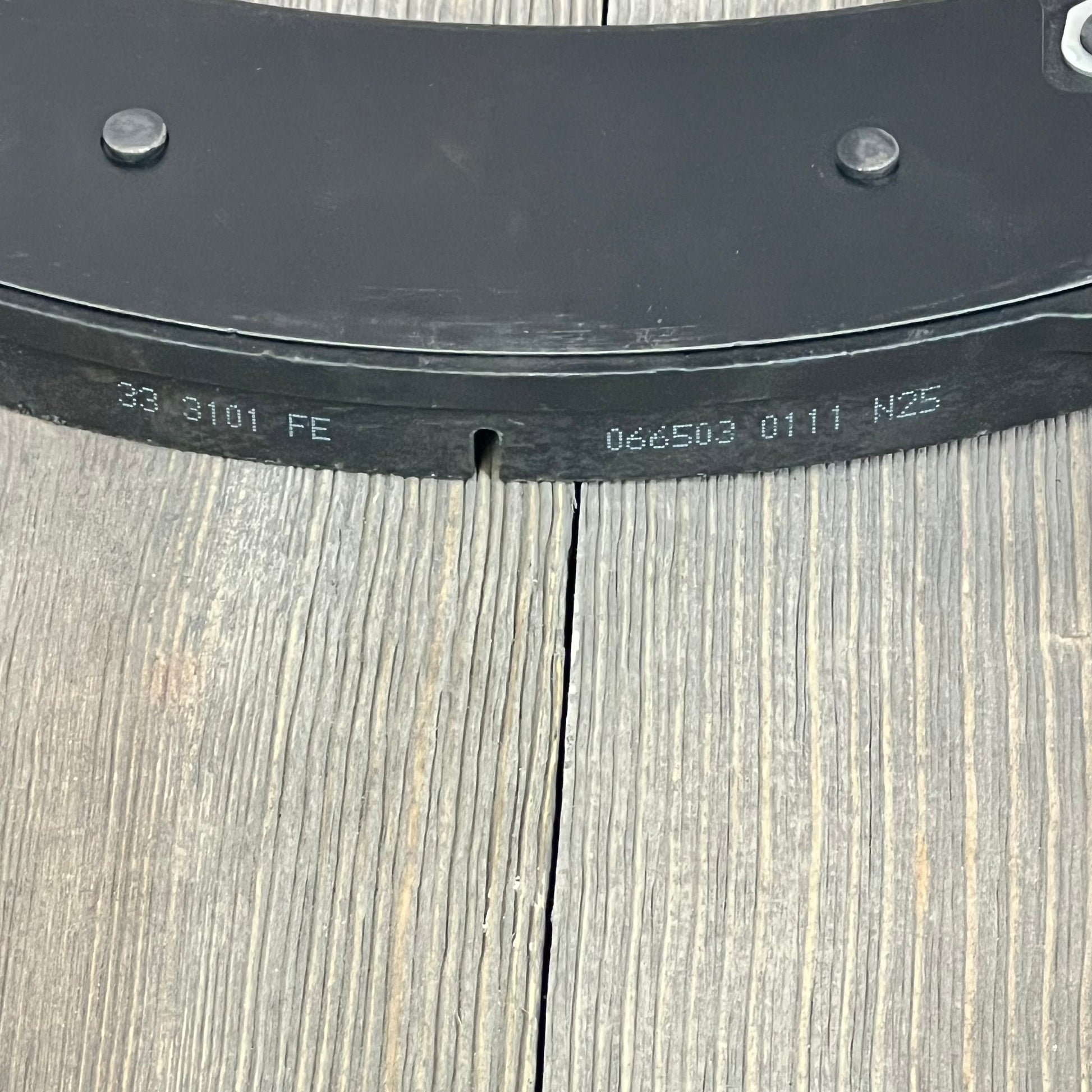 Close-up of ECCPP rear ceramic disc brake pad for Chevrolet Suburban and Silverado models, showcasing durability.