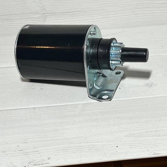 Starter motor for Kawasaki engines, compatible with FH381V to FH770D models, featuring robust metal housing.